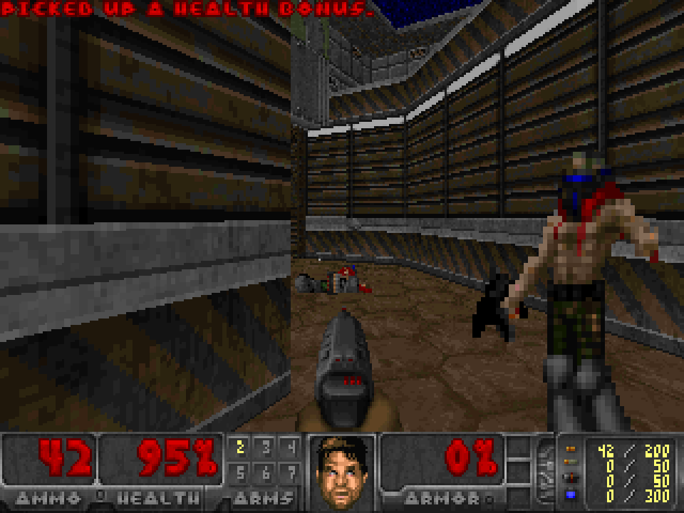 Doom: a zombie approaches down a corridor, the pistol raised